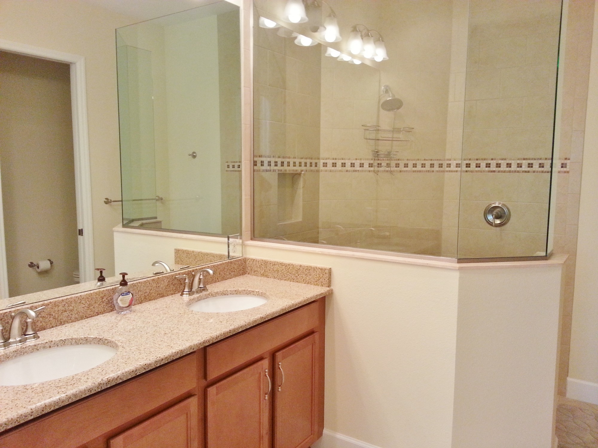 Large Master Bath features a BIG Shower, dual vanity, and granite tips!