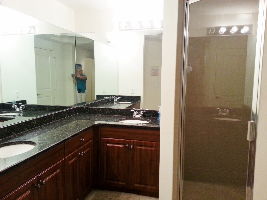 Master Bathroom with Dual Sinks and Granite Counter