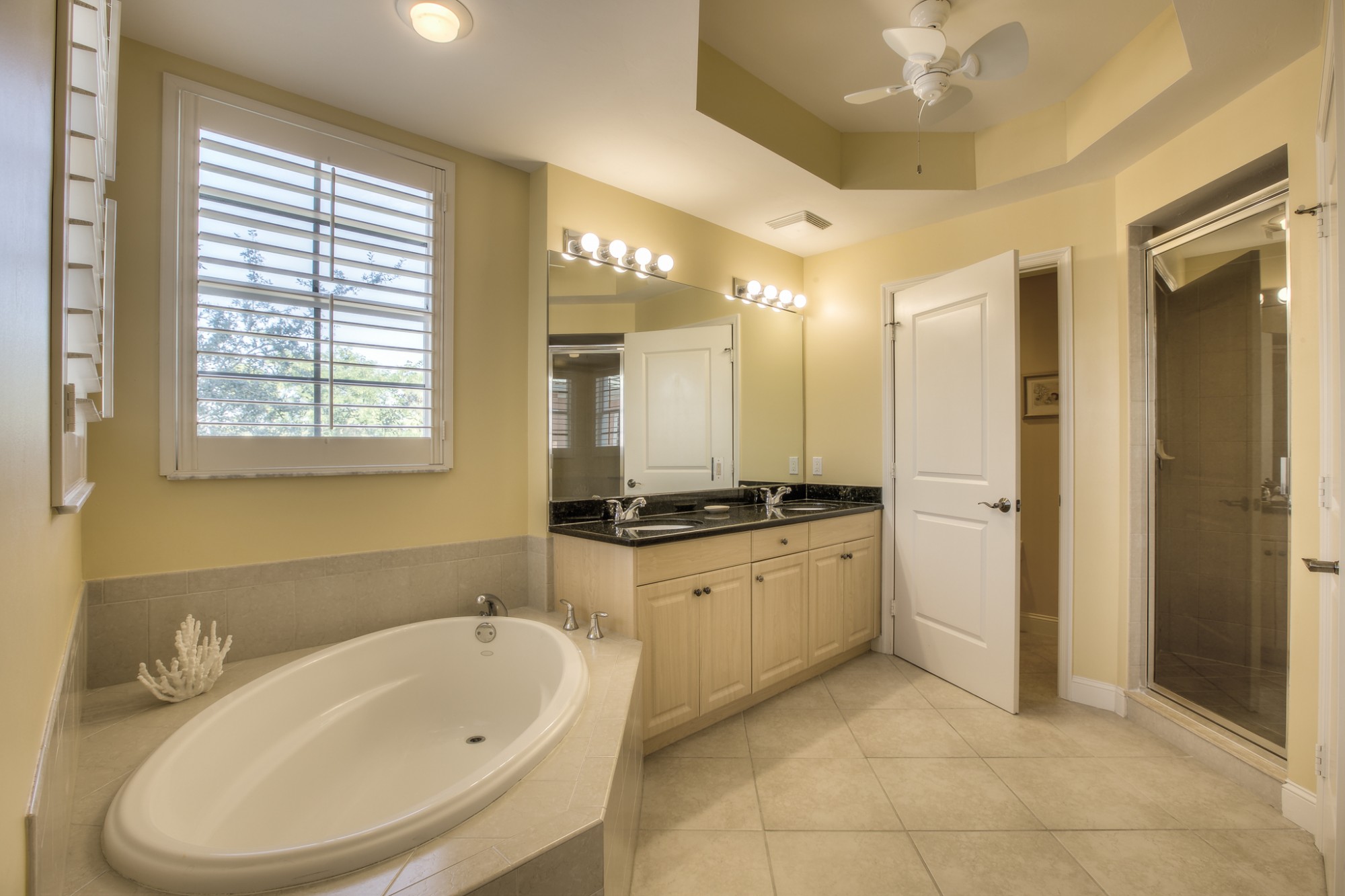 Master Bath with Dual Sinks, Granite Counter, Water-Closet, and Separate Walk-in Shower and Soaking Tub