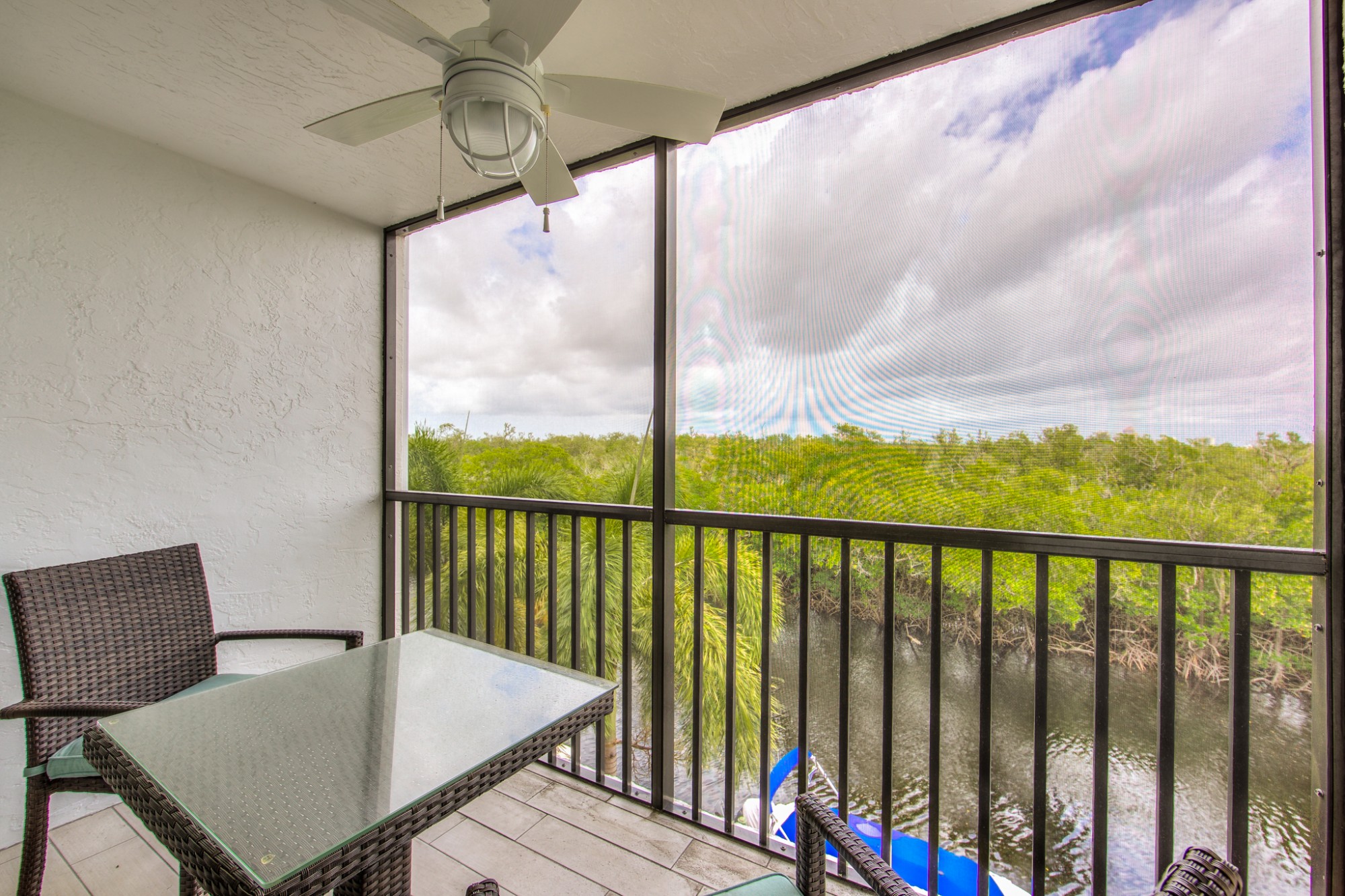 Screened-in Lanai with Canal View